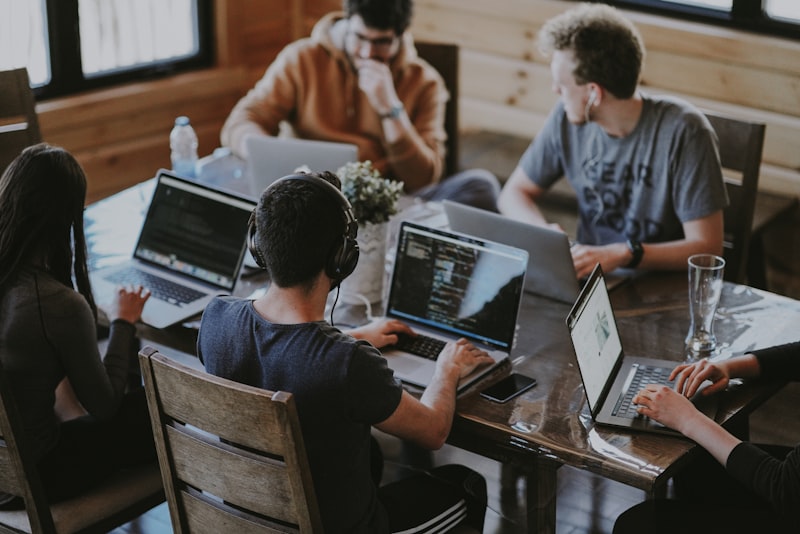 Team collaboration in modern office workspace